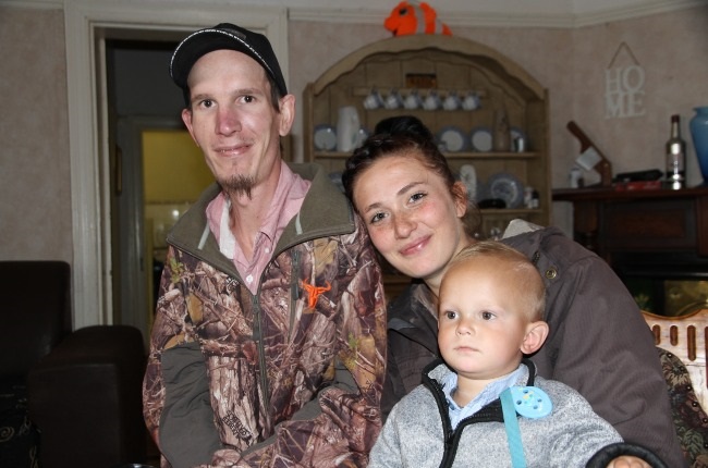 Riaan Erasmus, his girlfriend Andi and their son Riaan Jnr. Both Riaan and his son suffer from fibrodysplasia ossificans progressiva (Fop). (PHOTO: Supplied)