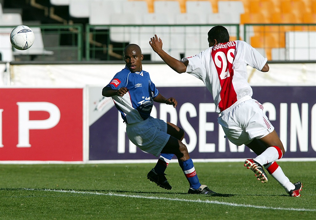 26 October 2003, Seuntjie Motlhajwa and Shane Poggenpoel during the PSL game between Supersport United and Ajax Cape Town at Loftus in Pretoria, South Africa. Photo Credit: - Gallo Images