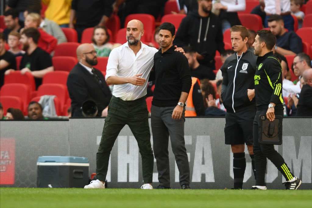 LONDON, ENGLAND - AUGUST 6: Pep Guardiola, Manager of Manchester City and Mikel Arteta, Manager of Arsenal on the side line during The FA Community Shield match between Manchester City and Arsenal at Wembley Stadium on August 6, 2023 in London, England. (Photo by Sportsphoto/Allstar via Getty Images)