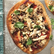 Shredded chicken pizza with olive salsa