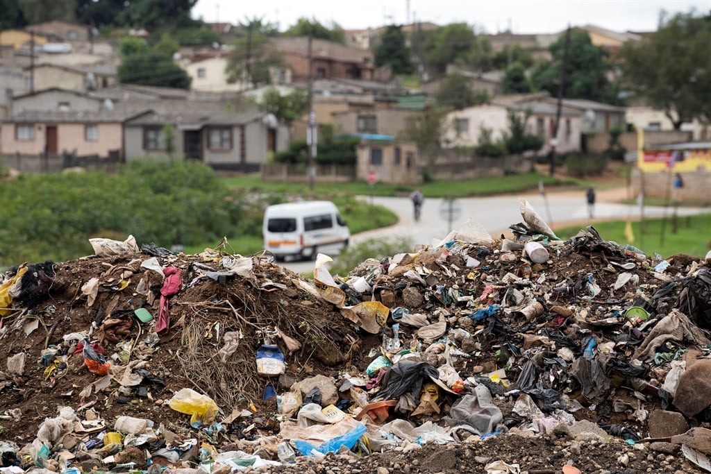 Rubbish piles in Ethandakukhanya, Mkhondo. (Luke Daniel/News24)