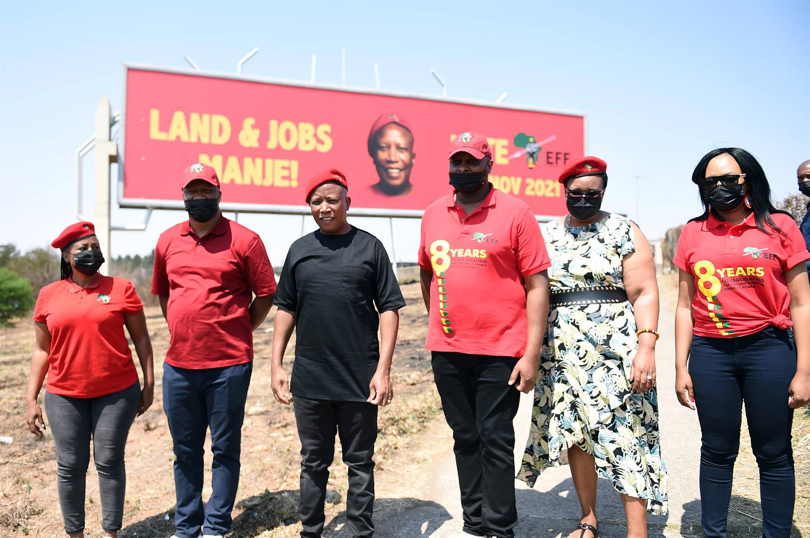Right: EFF leaders unveiled their election billboard along the R24 to OR Tambo Airport. Inset: Many Red Berets members were at Gandhi Square for the party’s local election manifesto launch at the weekend.            Photos by Christopher Moagi