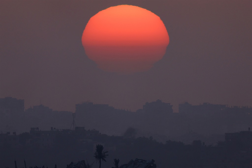 The sun sets over Gaza, amid the ongoing conflict 
