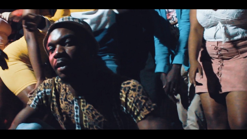 Vusi Mqenya in a clip from a music video