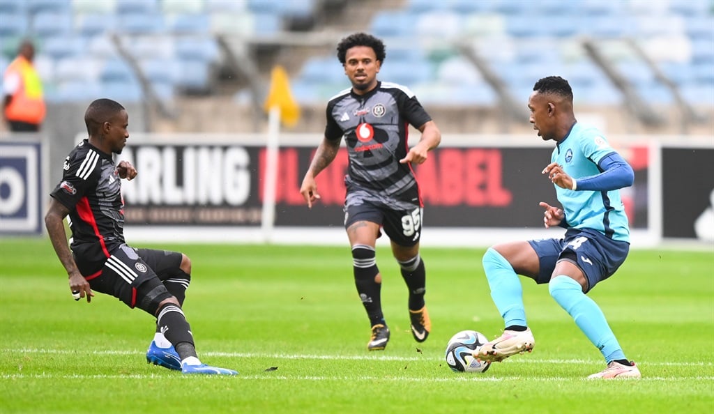 DURBAN, SOUTH AFRICA - NOVEMBER 04: Letsie Koapeng of Richards Bay FC is challenged by Thembinkosi Lorch of Orlando Pirates (left) and Kermit Erasmus of Orlando Pirates during the Carling Knockout, Quarter Final match between Richards Bay and Orlando Pirates at Moses Mabhida Stadium on November 04, 2023 in Durban, South Africa. (Photo by Gerhard Duraan/Gallo Images)