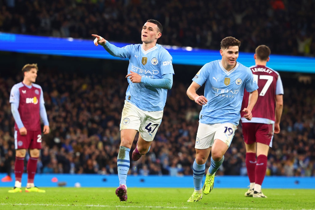 Phil Foden of Manchester City celebrates scoring his sides third goal during the Premier League match between Manchester City and Aston Villa at Etihad Stadium on April 03, 2024 in Manchester, England. (Chris Brunskill/Fantasista/Getty Images)