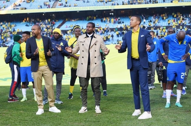 Mamelodi Sundowns' coach Rhulani Mokwena, flanked by Tiyani Mabunda and chairman Thlopie Motsepe, has challenged the club's supporters to show up more for the team that has done extremely well in South Africa. 
(Lefty Shivambu/Gallo Images)