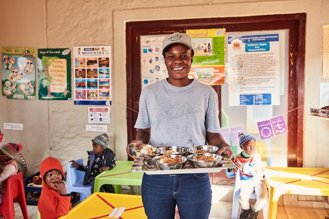 School feeding schemes by government, non-profit organisations and corporates are an immediate response to child hunger but more needs to be done to ensure food security for the long term. (Image: Supplied)