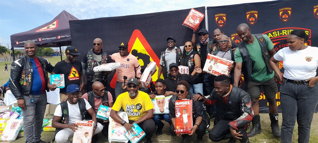 A group of men from various organisations came together and bought diapers for poor kids. Photo by Lulekwa Mnadamane
