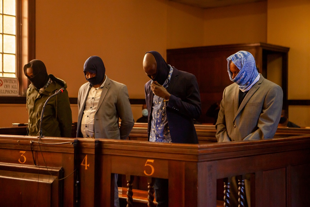 The four officers accused of the murder of Mthokizisi Ntumba appear in court. (Photo: Papi Morake/Gallo Images)