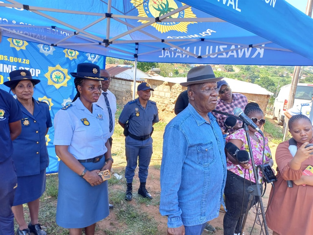 Police Minister Bheki Cele speaking to Desai residents in Durban, KZN.