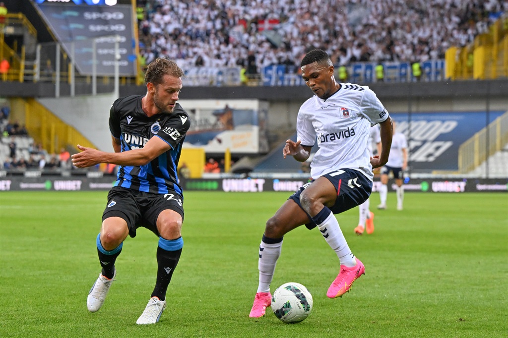 BRUGGE, BELGIUM - JULY 27: Mats Rits (26) of Club Brugge pictured in a duel with Gift Links (11) of Aarhus during the Uefa Conference League second qualifiyng round , first leg game in the 2023-2024 season between Club Brugge and AGF Aarhus from Denmark  on July 27 , 2023 in Brugge, Belgium. (Photo by Isosport/MB Media/Getty Images)