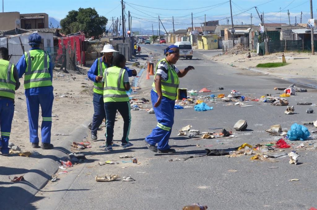 Workers from WasteCor company, which is contracted by the City of Cape Town to clean Khayelitsha streets, claim their employer didn't pay them. Photo by Lulelwa Mbadamane