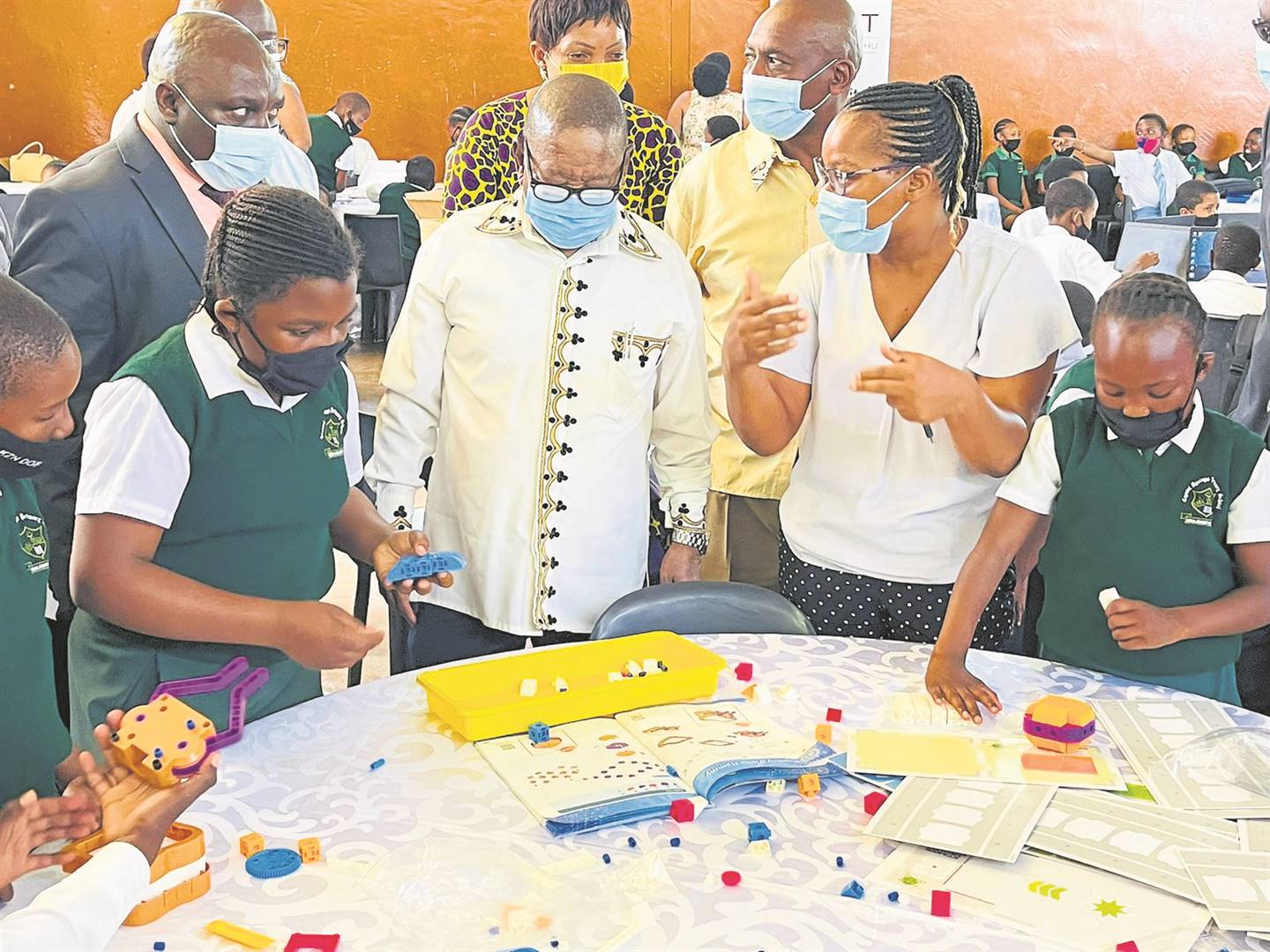 Minister of Higher Education and Training, Blade Nzimande ( in the middle), at Jabula Combined School in the Midlands where science and innovation learning tools were handed out.
