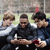 Risk and opportunity: How social media hinders and helps teen identity construction