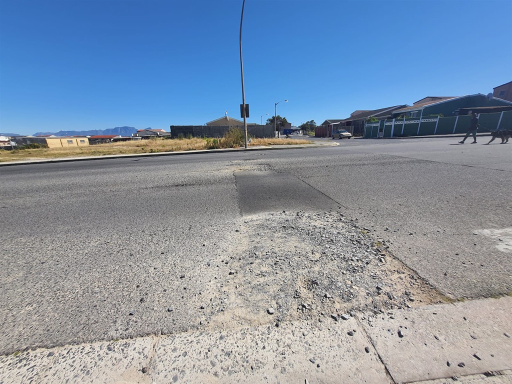 Some of the potholes in Oranjekloof Road, Tafelsig