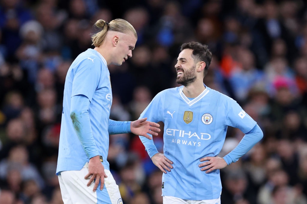 MANCHESTER, ENGLAND - MARCH 16: Bernardo Silva of Manchester City celebrates scoring his teams second goal with teammate Erling Haaland during the Emirates FA Cup Quarter Final match between Manchester City and Newcastle United at Etihad Stadium on March 16, 2024 in Manchester, England. (Photo by Alex Livesey/Getty Images)