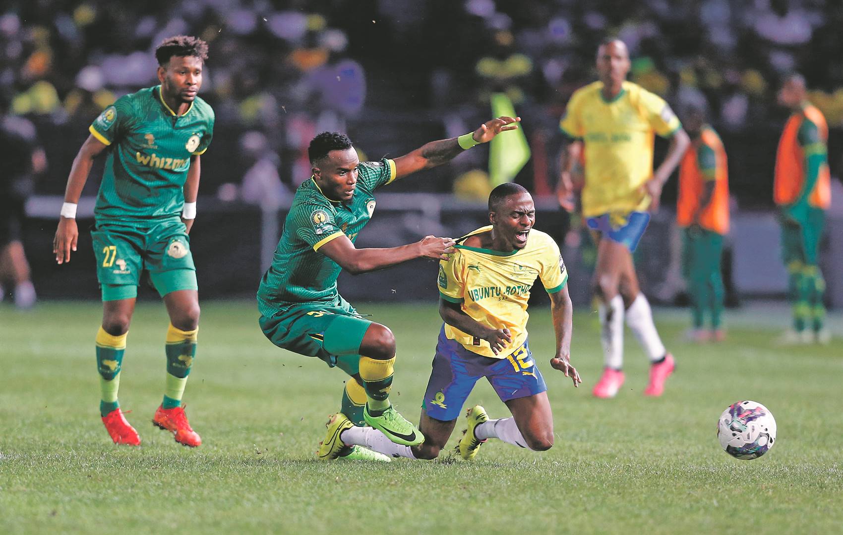 Thembinkosi Lorch of Mamelodi Sundowns in action with Dickson Job of Young Africans SC during the CAF Champions League match between Mamelodi Sundowns and Young Africans SC at Loftus Versfeld on  5 April.