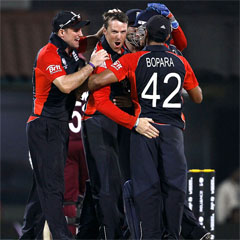 England celebrate the wicket of Ramnaresh Sarwan. (AFP)