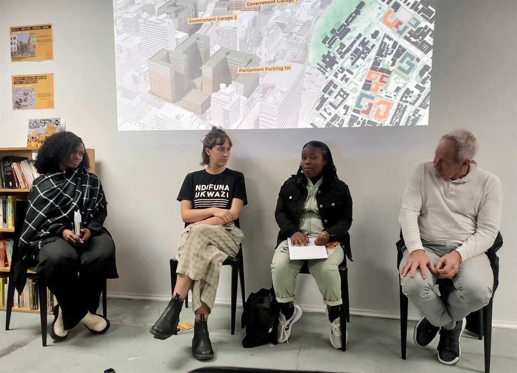 Ndifuna Ukwazi's Mpho Raboeane and Robyn Park-Ross, Anoxolo Felane from Indibano Yabahlali and Malcolm McCarthy, former National Association of Social Housing Organisations (NASHO), joined in a panel discussion on Tuesday night about affordable housing in Cape Town. (Marecia Damons/GroundUp)