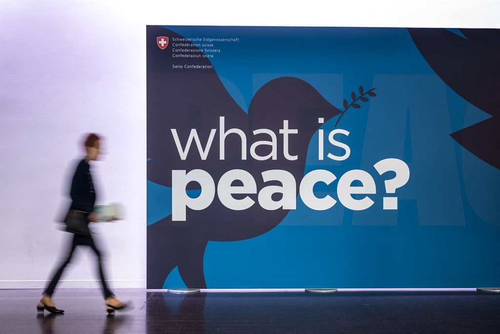 A banner during an International Cooperation Forum organised by Swiss Federal Department of Foreign Affairs dedicated to the topic of peace, in Basel, in April 2024. (Fabrice COFFRINI / AFP)