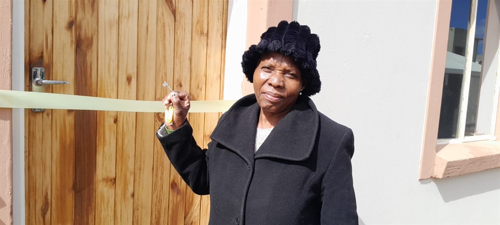 Glemmy Maputa is over the moon after receiving keys to her new house at Helderwyk in Brakpan, Ekurhuleni on Tuesday, 9 April. Photo by Happy Mnguni
