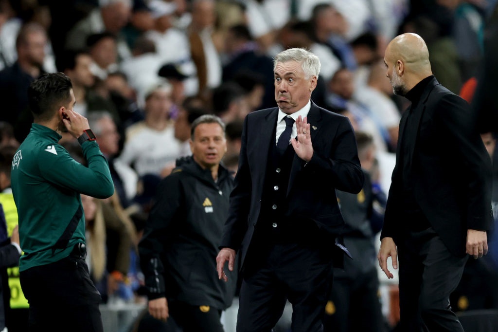 Carlo Ancelotti of Real Madrid, reacts alongside Pep Guardiola of Manchester City. (Clive Brunskill/Getty Images)