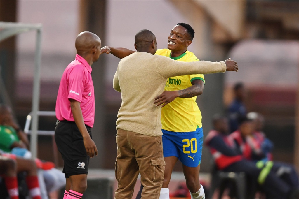 Grant Kekana celebrates his goal with coach Rulani Mokwena during the DStv Premiership match between Mamelodi Sundowns and Golden Arrows at Lucas Moripe Stadium on August 15, 2023 in Pretoria, South Africa. 