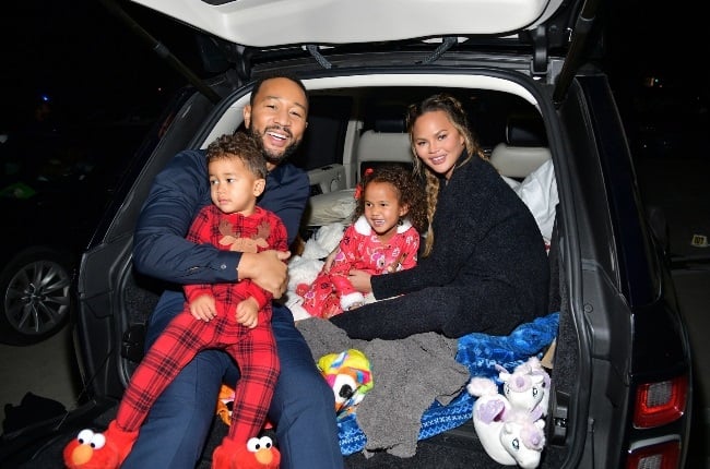 Singer John Legend with wife Chrissy Teigen and th