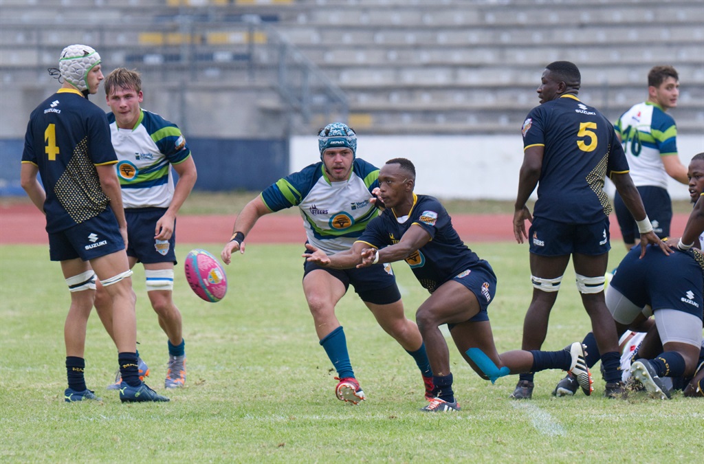 Mpumelelo Solani Mavuso of NMU Suzuzki activation Build burger during the Varsity Shield rugby match between the Madibaz and varsity College at the Madibaz stadium field, Friday 5 April 2024. 