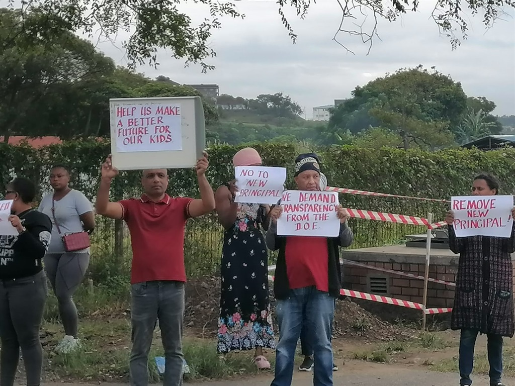 Parents held a demonstration outside Dr Macken Mistry Primary School in Sea Cow Lake, Durban, demanding the removal of the school's new principal on Thursday. (Supplied)