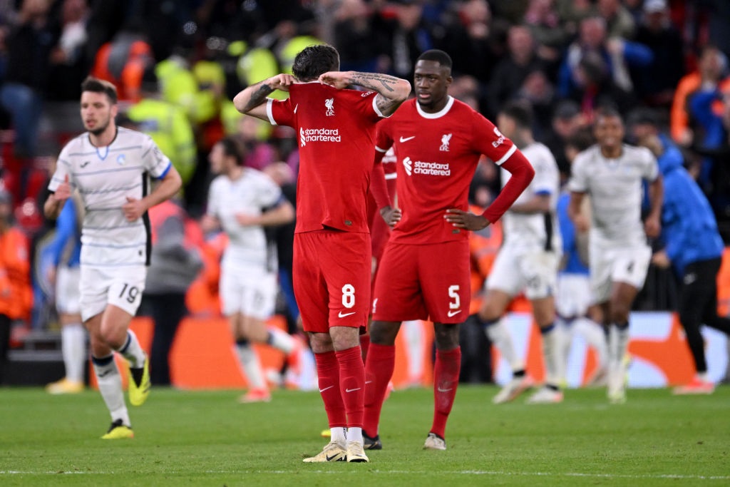 LIVERPOOL, ENGLAND - APRIL 11: Dominik Szoboszlai of Liverpool reacts after Mario Pasalic of Atalanta BC scores his teams third goal during the UEFA Europa League 2023/24 Quarter-Final first leg match between Liverpool FC and Atalanta at Anfield on April 11, 2024 in Liverpool, England. (Photo by Stu Forster/Getty Images)