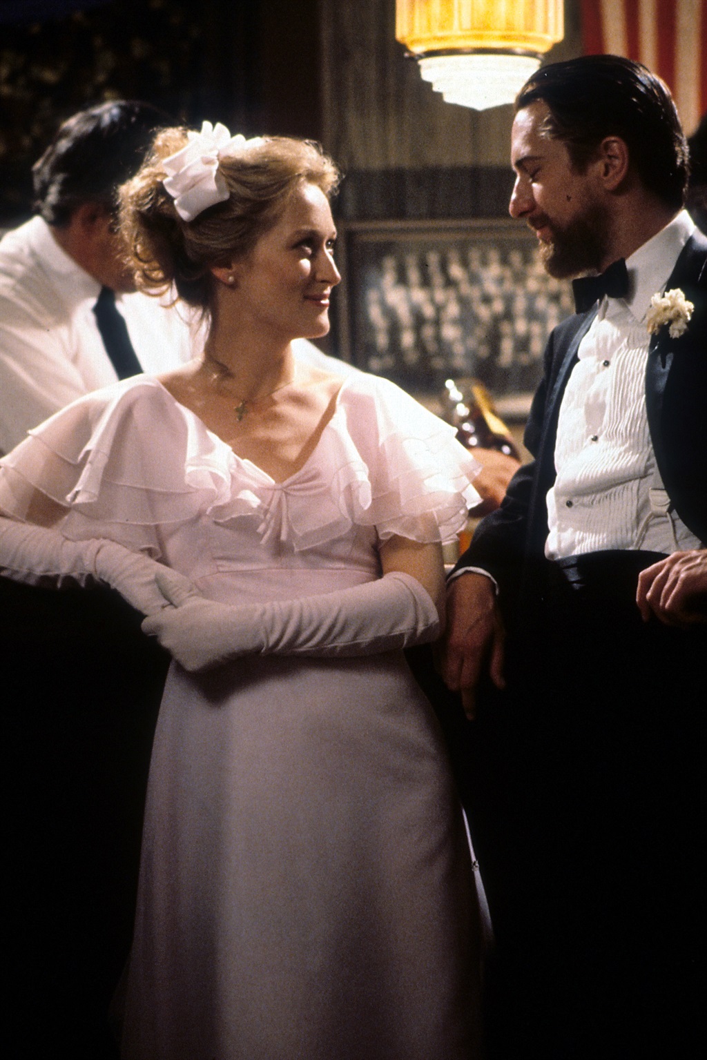 Meryl Streep smiling at Robert De Niro in a scene 