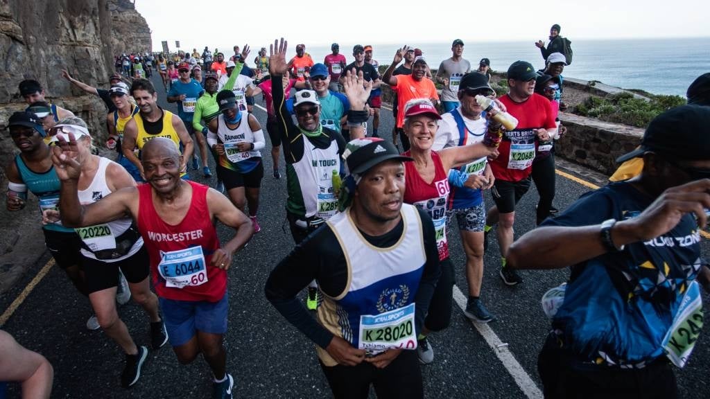 Runners are seen on Chapman's Peak Drive during the 2023 Two Oceans Marathon in Cape Town. (Brenton Geach/Gallo Images)