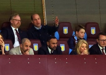 Football-mad Prince William and Prince George spotted cheering on their beloved Aston Villa