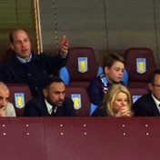 Football-mad Prince William and Prince George spotted cheering on their beloved Aston Villa