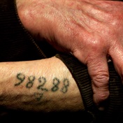 Israeli court blocks auction of Auschwitz tattoo stamps