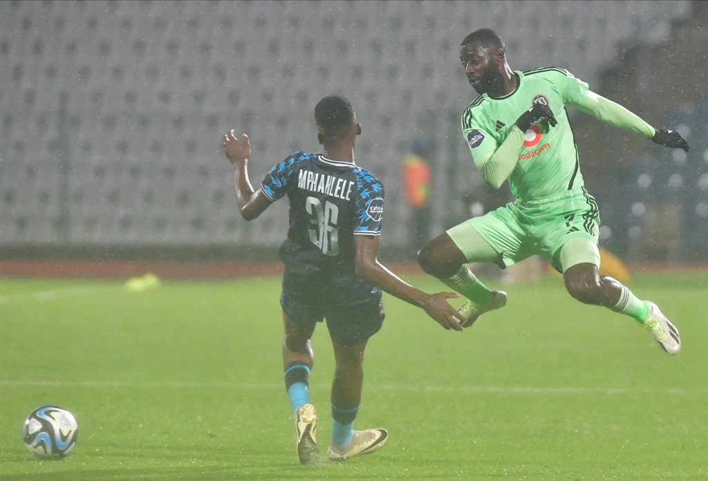JOHANNESBURG, SOUTH AFRICA - APRIL 03:  Deon Hotto of Orlando Pirates and Auhustine Mahlokulu of Moroka Swallows during the DStv Premiership match between Moroka Swallows and Orlando Pirates at Dobsonville Stadium on April 03, 2024 in Johannesburg, South Africa. (Photo by Sydney Seshibedi/Gallo Images)