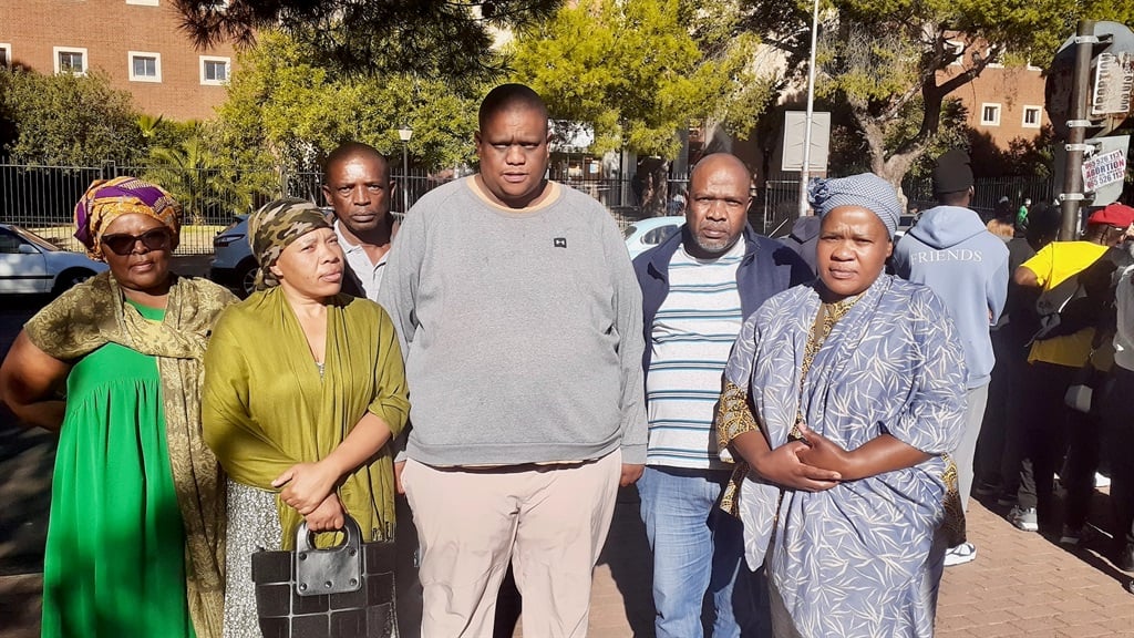 From left: Xoliswa Miso (family friend), Mampho Molaudi (Thato Molaudi’s mother), Morare Sekoai (his landlord), Nkhatho Molaudi (his uncle), George Mapane (his uncle), and Tlalane Molaudi (his aunt). (Becker Semela, GroundUp)