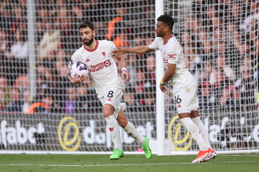 BOURNEMOUTH, ENGLAND - APRIL 13: Bruno Fernandes of Manchester United scores a goal to make the penalty goal to make it 2-2 during the Premier League match between AFC Bournemouth and Manchester United at Vitality Stadium on April 13, 2024 in Bournemouth, England.(Photo by Catherine Ivill - AMA/Getty Images)