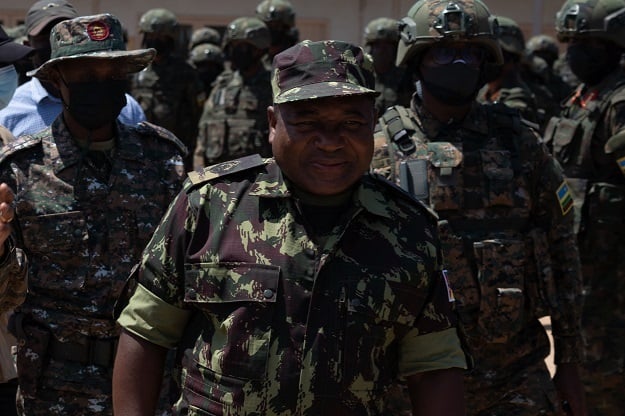 Mozambican President Filipe Nyusi, wearing militar