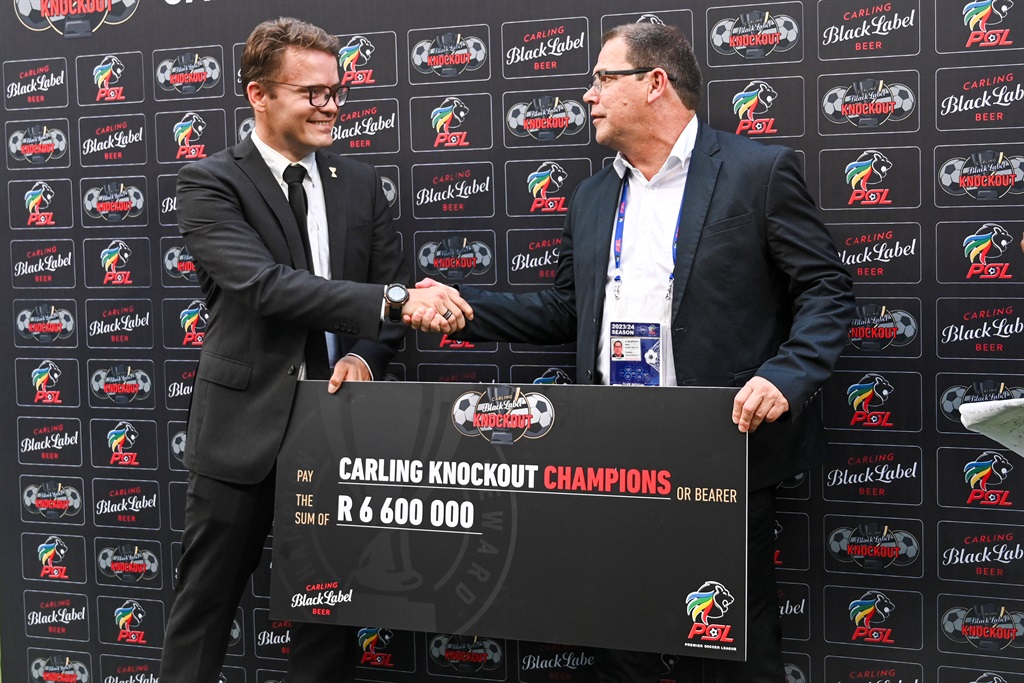 Stellenbosch FC CEO Rob Benadie receives the Carling Knockout Cup winners' R6.6 million cheque after Stellies won their first major PSL cup competition on 16 December 2023 at Moses Mabhida Stadium in Durban. Benadie has led a process that led to the club now having a women's football club