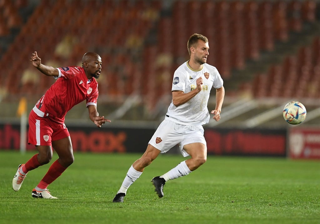 POLOKWANE, SOUTH AFRICA - APRIL 17: Andre De Jong of Stellenbosch FC and Kamohelo Mokotjo of Sekhukhune United during the DStv Premiership match between Sekhukhune United and Stellenbosch FC at Peter Mokaba Stadium on April 17, 2024 in Polokwane, South Africa. (Photo by Philip Maeta/Gallo Images)