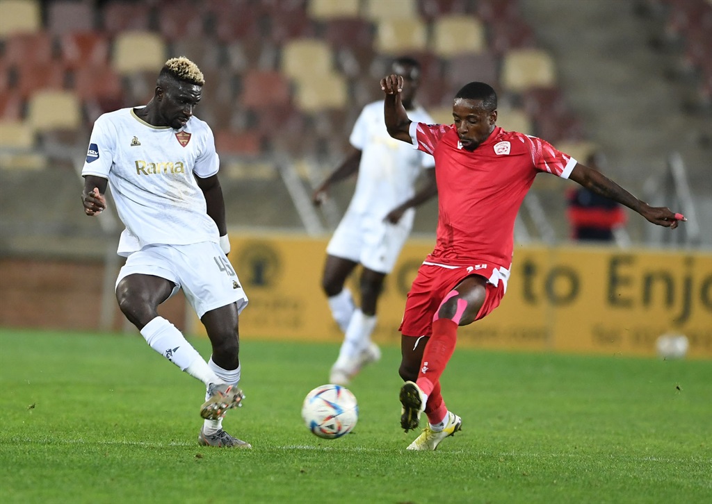 POLOKWANE, SOUTH AFRICA - APRIL 17: Ismael Toure of Stellenbosch FC and Vusimuzi Mncube of Sekhukhune United during the DStv Premiership match between Sekhukhune United and Stellenbosch FC at Peter Mokaba Stadium on April 17, 2024 in Polokwane, South Africa. (Photo by Philip Maeta/Gallo Images)