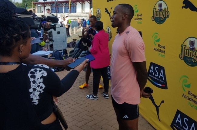 Sport | Simbine poses a question of style over sprinting prodigy Bayanda Walaza's running gait...
