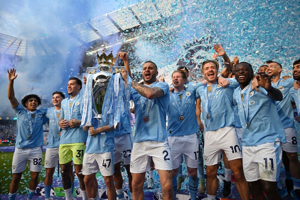 Kyle Walker of Manchester City lifts the Premier League trophy after their team's victory during the Premier League match against West Ham United at Etihad Stadium on 19 May 2024 in Manchester, England. (Michael Regan/Getty Images)