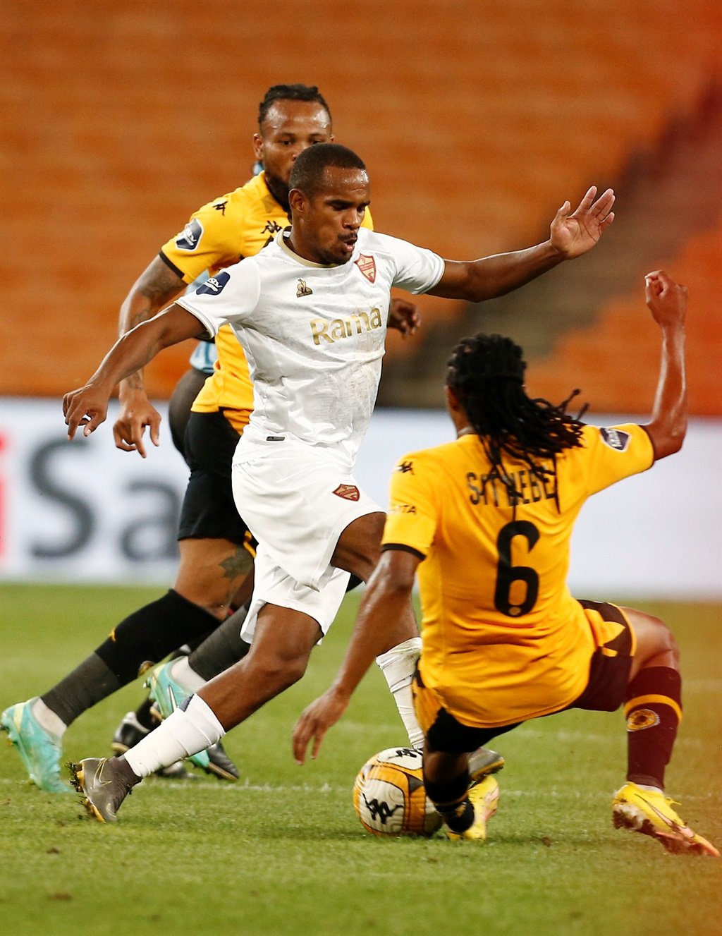 JOHANNESBURG, SOUTH AFRICA - APRIL 02: Edmilson Dove and Siyethemba Sithebe of Kaizer Chiefs in action with Iqraam Ryners of Stellenbosch FC during the DStv Premiership match between Kaizer Chiefs and Stellenbosch FC at FNB Stadium on April 02, 2024 in Johannesburg, South Africa. (Photo by Gallo Images)