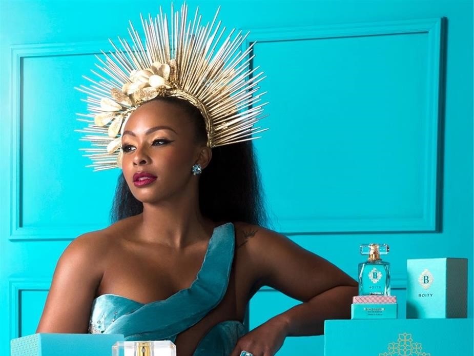 Boity Thulo with the perfume that is currently under scrutiny.