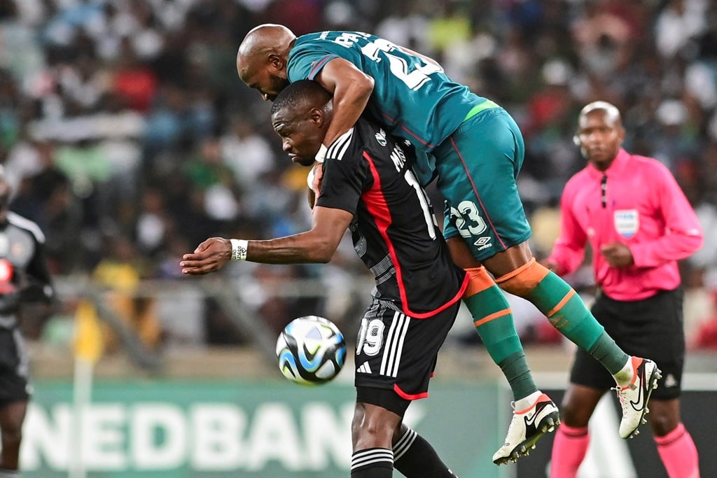 DURBAN, SOUTH AFRICA - APRIL 13: Ramahlwe Mphahlele of AmaZulu FC and Tshegofatso Mabasa of Orlando Pirates during the Nedbank Cup, Quarter Final match between AmaZulu FC and Orlando Pirates at Moses Mabhida Stadium on April 13, 2024 in Durban, South Africa. (Photo by Darren Stewart/Gallo Images)