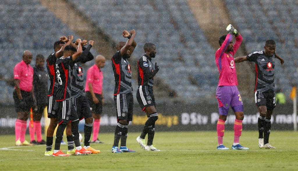 Orlando Pirates greet fans during the DStv Premiership match between Orlando Pirates and Golden Arrows at Orlando Stadium on April 06, 2024 in Johannesburg, South Africa. 